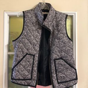 Black and white vest, size large